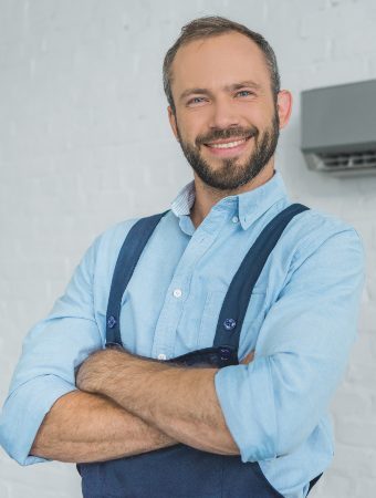 smiling-bearded-repairman-posing-with-crossed-arms-9WEV98W-1-qazfr7rwzbzfmkakc5ivulo2i5sn0jliy008csv9n8
