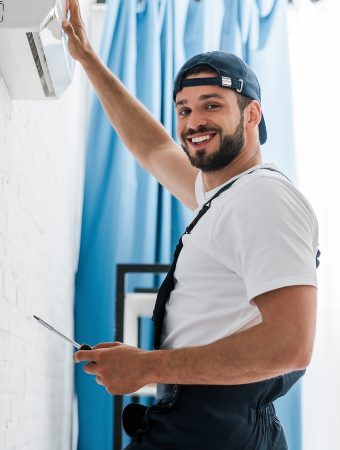 smiling-workman-looking-at-camera-while-repairing-2021-09-21-23-34-35-utc-1-1-qazfqum6bnhf40togzu3vozm6rli0s5a86vfmxes2c (3)